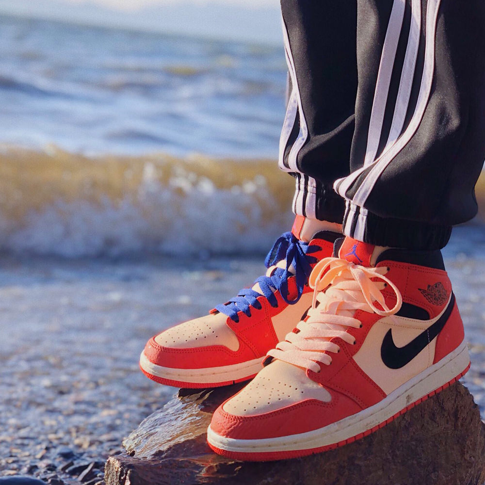black team orange jordan 1