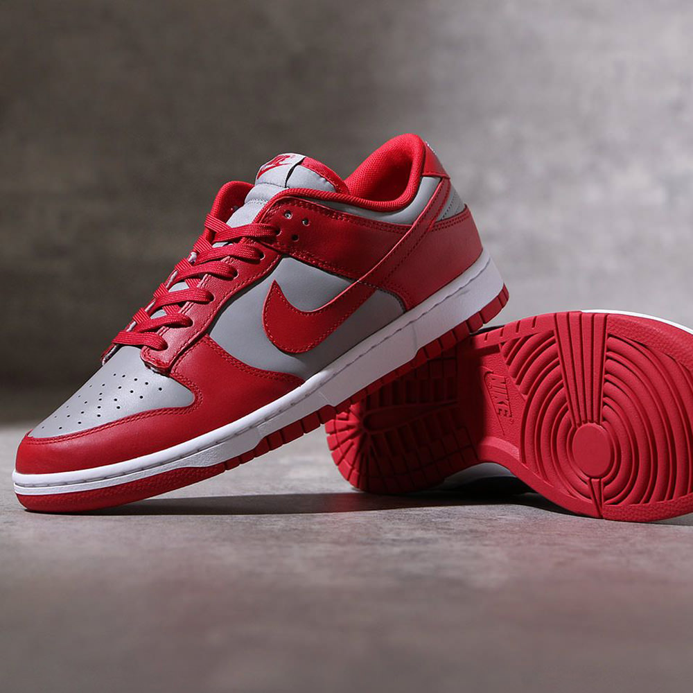 nike dunks low gray and red