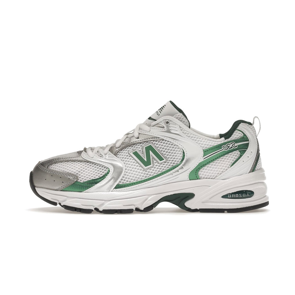 New Balance 530 sneakers in white and green