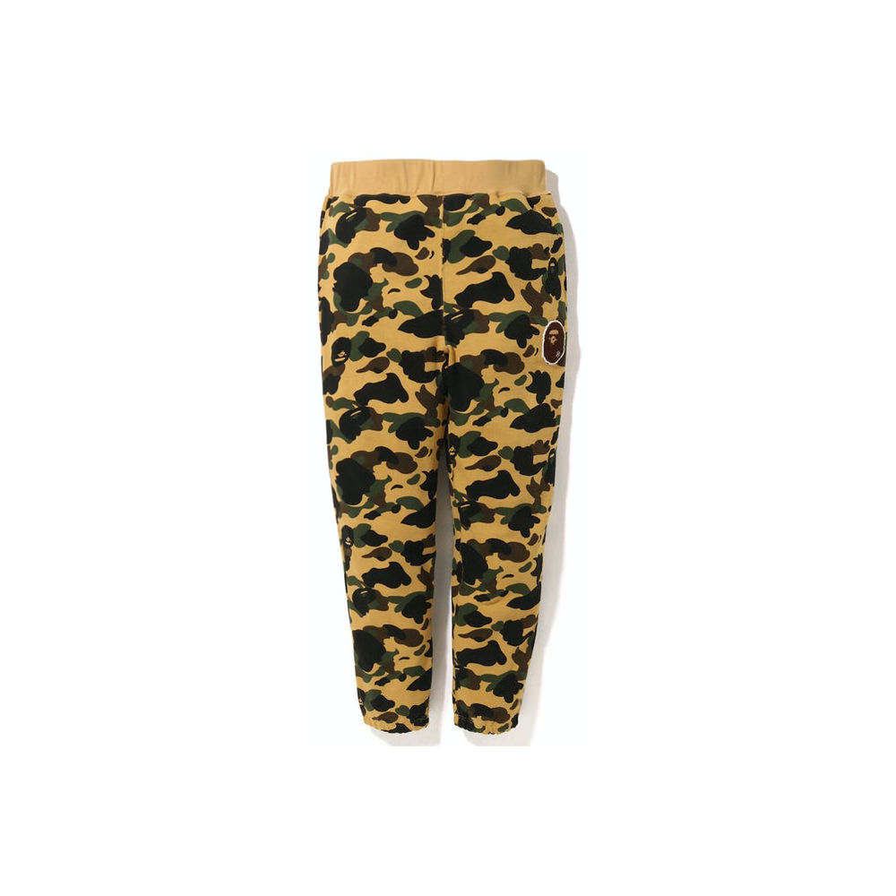 BAPE 1St Camo Ape Head Patched Sweatpants (FW22) YellowBAPE 1St Camo Ape  Head Patched Sweatpants (FW22) Yellow - OFour